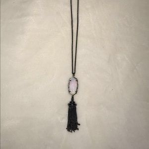 Rayne Kendra Scott necklace w an iridescent stone.